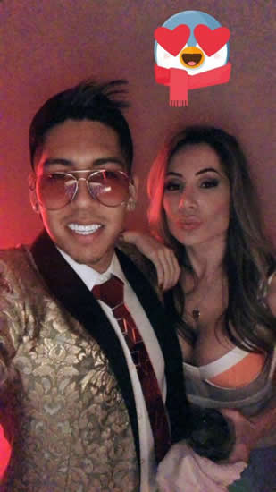 Roberto Firmino shows off another bizarre red metal tie as Liverpool star sees in New Year with wife