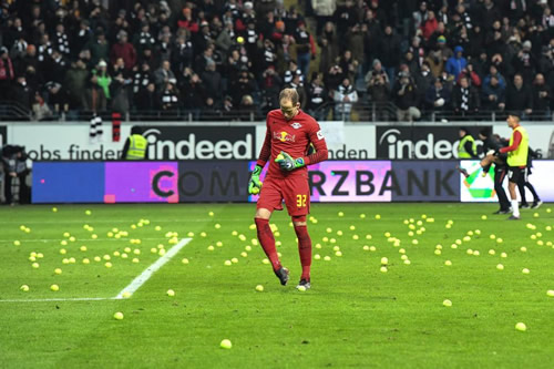 Eintracht Frankfurt fans throw hundreds of tennis balls on to the pitch because they hate Mondays