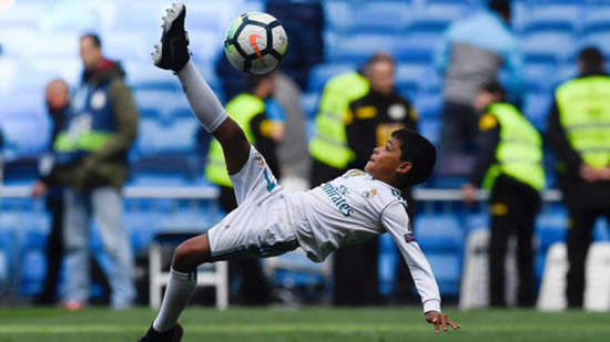 Cristiano Ronaldo Jr. emulates his dad with an overhead kick