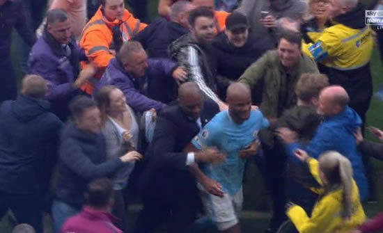 Manchester City set for FA charge after fans invade pitch but Pep Guardiola defends title celebrations at The Etihad