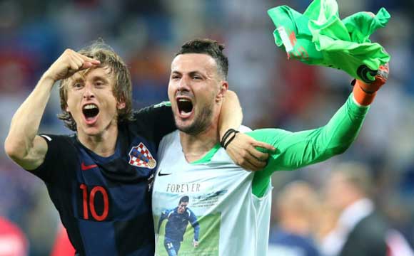 Croatia 1 Denmark 1 (aet, 3-2 on penalties): Rakitic spares Modric blushes with winning spot-kick