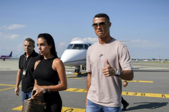 Cristiano Ronaldo arrives in Turin with girlfriend Georgina Rodriguez ahead of Juventus unveiling