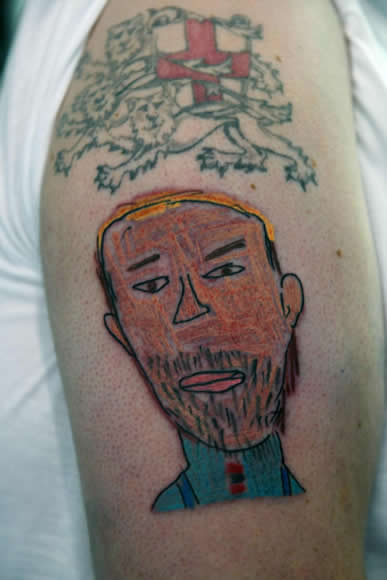 England fan has kid's drawing of Gareth Southgate tattooed on arm for charity after World Cup heroics
