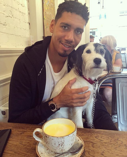Man United defender Chris Smalling and wife Sam Cooke take dog on cafe date