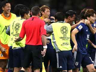 Iran 0 Japan 3: Controversial Osako brace helps book final place