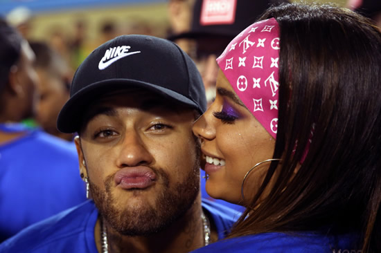 Neymar kisses and parties with stunning pop star Anitta at Rio Carnival as PSG star relaxes while recovering from foot injury