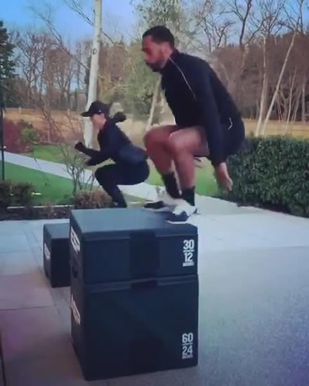 Man Utd legend Rio Ferdinand and Kate Wright show off 6am workout… before he comes a cropper on box jumps