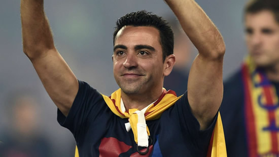 Barcelona legend Xavi announces retirement