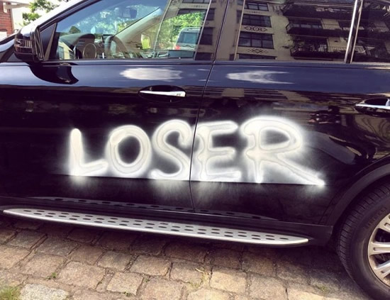 Liverpool flop Loris Karius' girlfriend has 'LOSER' spray-painted on her luxury motor after his blunders at Besiktas