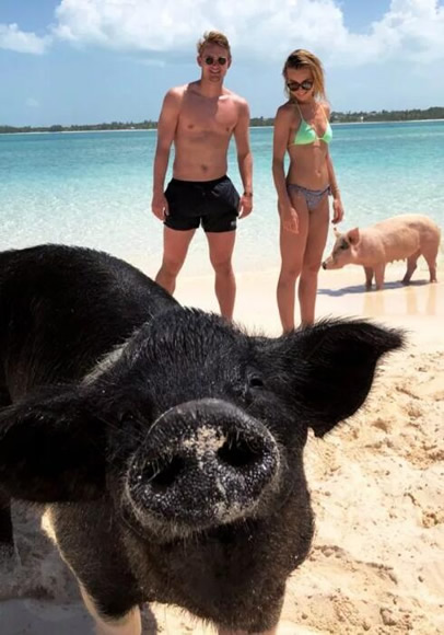 Matthijs de Ligt and Wag AnneKee Molenaar play with pigs on Bahamas beach as Ajax kid nears Juventus transfer