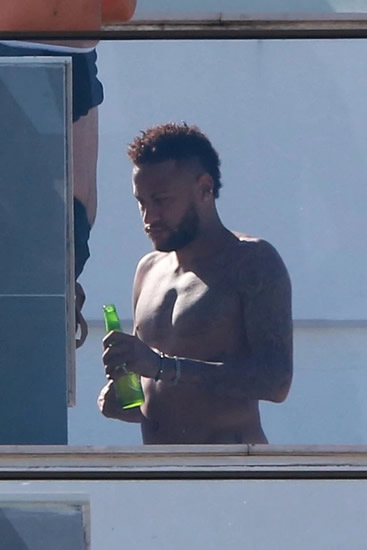 OH BEER Barcelona confirm Neymar wants return but club not interested, putting future of PSG star in limbo as he swigs on bottle in sun with pals