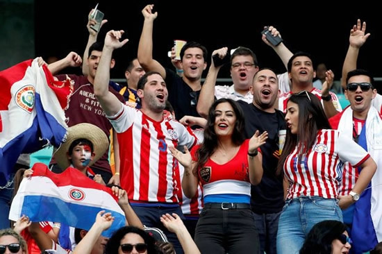 World Cup's 'sexiest fan' who stripped for final cheers on Paraguay ahead of Brazil clash