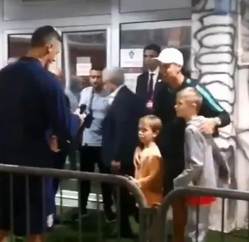 Watch Cristiano Ronaldo high five Man Utd star Nemanja Matic’s son in tunnel before giving him Portugal shirt after win over Serbia