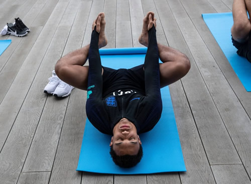 England stars ready to stop Kosovo’s unbeaten stretch by limbering up in yoga session