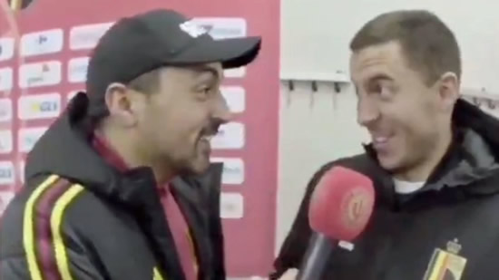 Hazard shows off some of his Spanish with a journalist