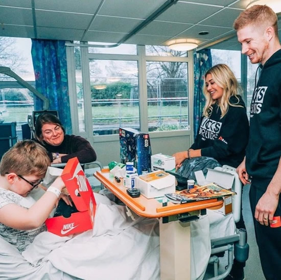 Classy Man City star Kevin de Bruyne and wife Michele surprise kids in hospital with Christmas presents
