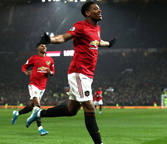 Manchester United 4-1 Newcastle United: Martial helps Red Devils get in the festive spirit
