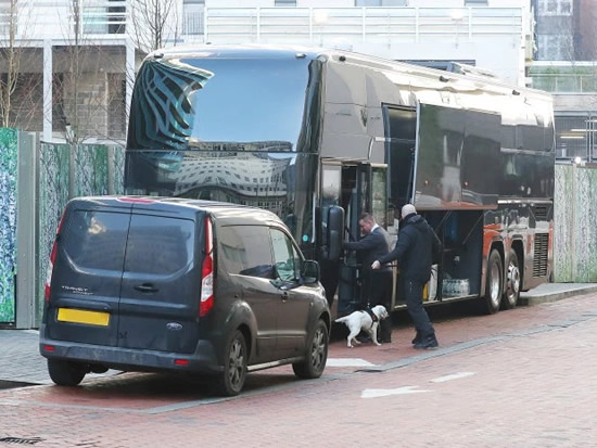 RUFF START Man Utd coach checked by sniffer dog amid security fears as Solskjaer’s squad leave The Lowry for Liverpool clash