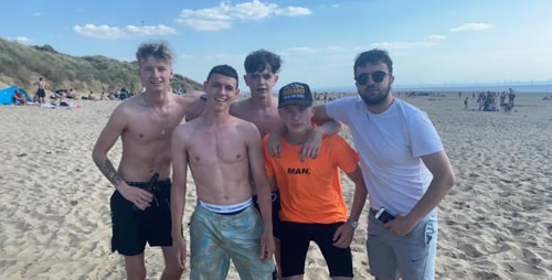 Phil Foden risks Man City wrath as midfielder breaks social distancing rules to have beach kick-about