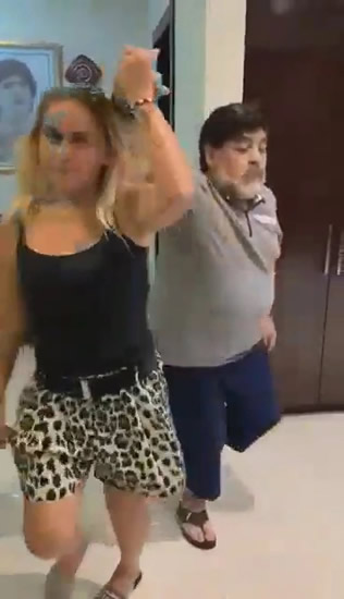 WHAT A TWERK Watch Diego Maradona flash bum at camera as he drops his trousers while dancing with former girlfriend