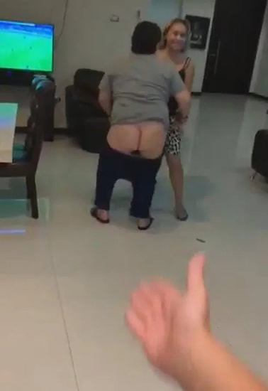 WHAT A TWERK Watch Diego Maradona flash bum at camera as he drops his trousers while dancing with former girlfriend