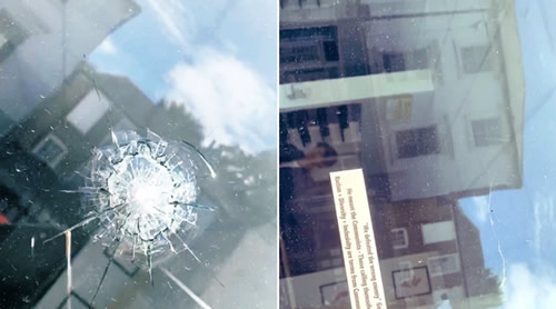 Dagenham and Redbridge player aghast to find bullet lodged in window of his salon
