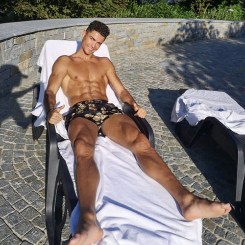 Cristiano Ronaldo shows off incredible ripped body aged 35… and Piers Morgan praises Juventus star’s ‘good abs’