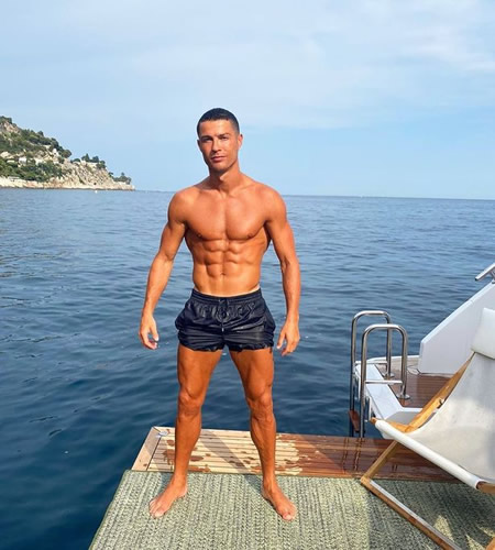Cristiano Ronaldo shows off ripped physique as he poses in swimming shorts on yacht holiday