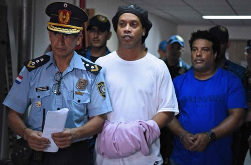 Ronaldinho being released from prison after over five months but under strict conditions