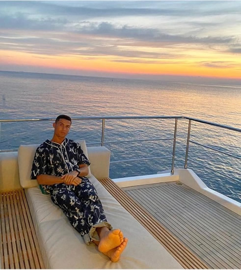 TEARS BEFORE BEDTIME Cristiano Ronaldo does NOT look happy as Juventus star wears £1,800 Louis Vuitton pyjamas while on his luxury yacht