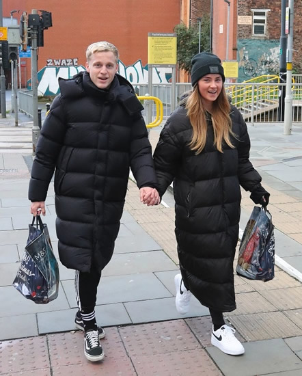 BEEK FRIDAY Man Utd ace Van de Beek goes Christmas shopping wearing matching ‘sleeping bag’ coats with girlfriend Estelle Bergkamp