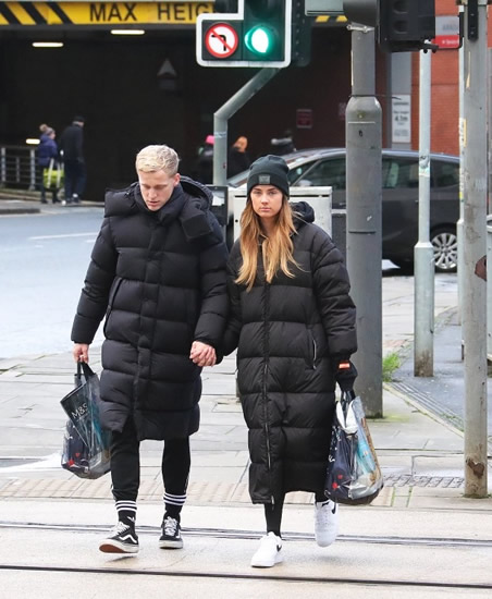BEEK FRIDAY Man Utd ace Van de Beek goes Christmas shopping wearing matching ‘sleeping bag’ coats with girlfriend Estelle Bergkamp