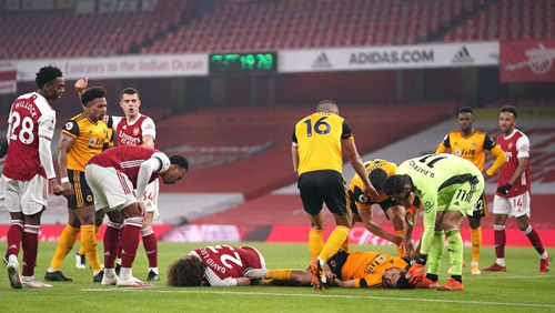 Wolves' Raul Jimenez taken to hospital after clash of heads with David Luiz