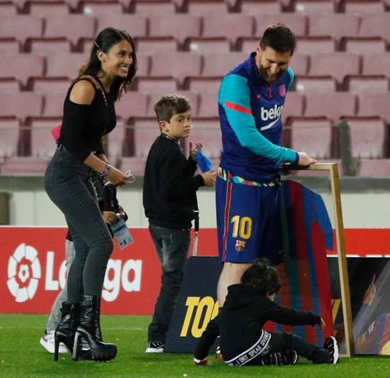 Lionel Messi given framed Barcelona shirt in front of Antonella Roccuzzo and kids after breaking appearance record