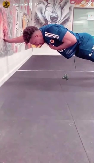 Inside Adama Traore's crazy strength training regime as Wolves star tackles pull-up bars with man clinging to him
