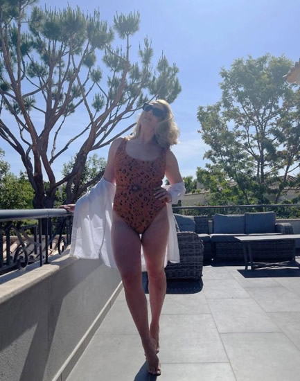 Harry Kane's wife Katie shows off beach body in animal print swimsuit leaving loved-up England captain stunned