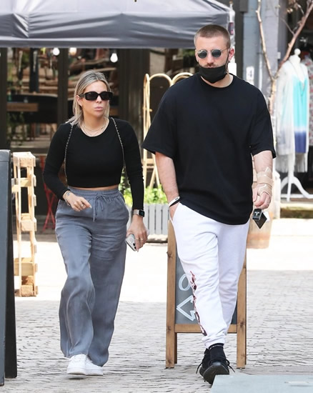 Man Utd star Luke Shaw sparks England Euro 2020 injury fears as he wears cast while out with girlfriend Anouska Santos