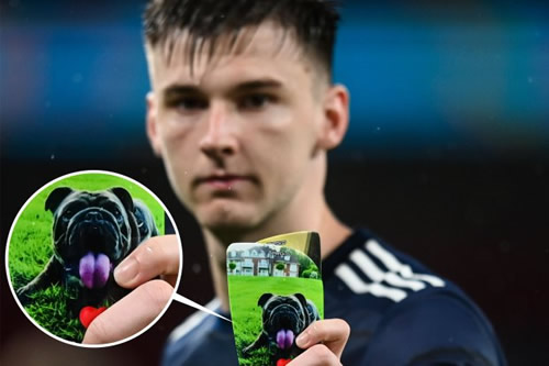 Kieran Tierney shows off custom shin pads featuring a dog picture after heroic Scotland display vs England