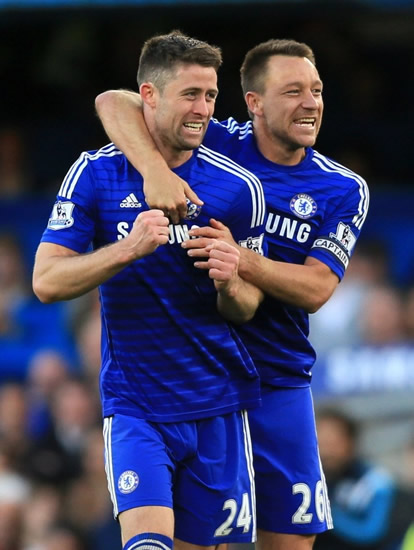 Gary Cahill shows off ripped body as Chelsea legend John Terry jokes 'that's why I made you get changed away from me'