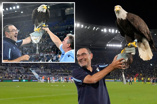 Maurizio Sarri holds live EAGLE aloft to celebrate Lazio’s derby win over bitter rivals Jose Mourinho’s Roma