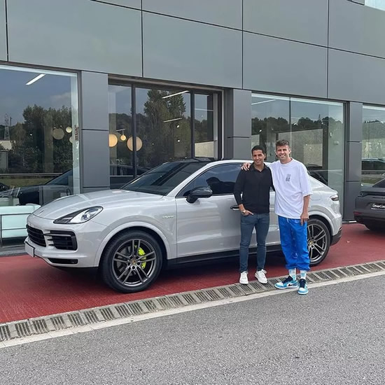 Pique buys 100,000 euro car but his socks steal the show
