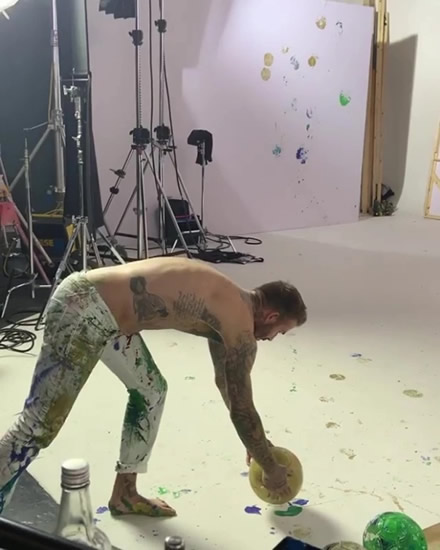 BECK THE HALLS David Beckham goes topless to show off his festive free-kick skills