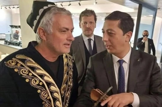 DRESSED TO IMPRESS Ex-Chelsea and Man Utd boss Jose Mourinho pulls out all the stops to impress Uzbekistan visitors at Roma