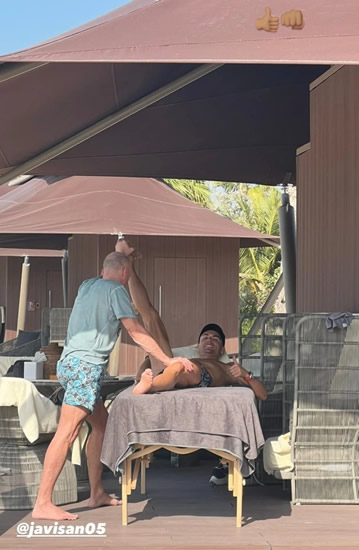 Man Utd star Cristiano Ronaldo enjoys massage on winter break before sipping from a coconut in just his pants