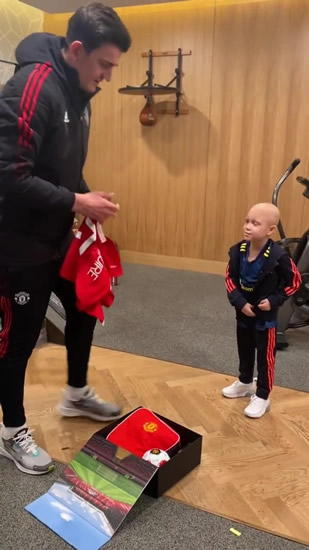HAPPY HARRY Man Utd captain Harry Maguire has kickabout with ‘legend’ River Rhodes as young child battles cancer