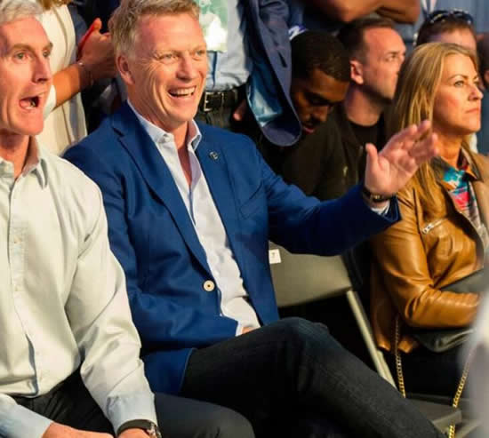 Playboy model sat on West Ham boss David Moyes' knee as he watched boxing