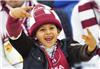 A Qatari boy cheers for the team before the 2011 Asian Cup quarter-final football match between Qatar and Japan in Doha, capital of Qatar, Jan. 21, 2011.
