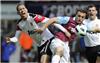 Chris Smalling feels the full force of Mark Noble's challenge