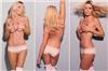 Feast for the mince pies ... Abbey Clancy goes bra-less for magazine