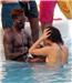 Poolside ... Emmanuel Adebayor and lady friend